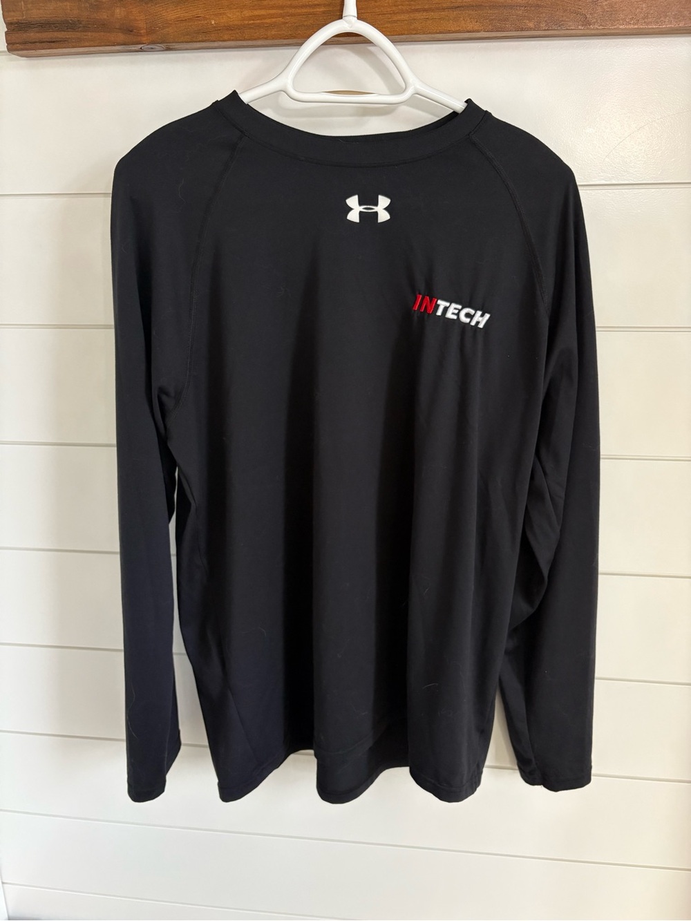 Black under armour Athletic HeatGear Top with White Logo and Red Accent